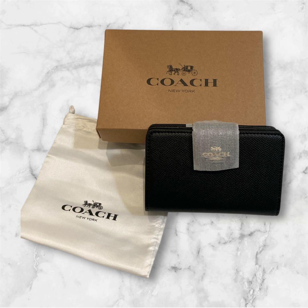 新品✨COACH ブラック レザー 二つ折り 財布 シンプル