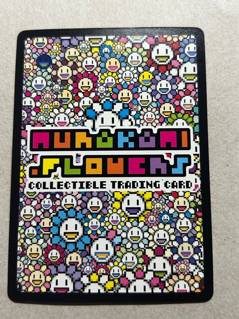 めまいを起こす背景UR 村上隆