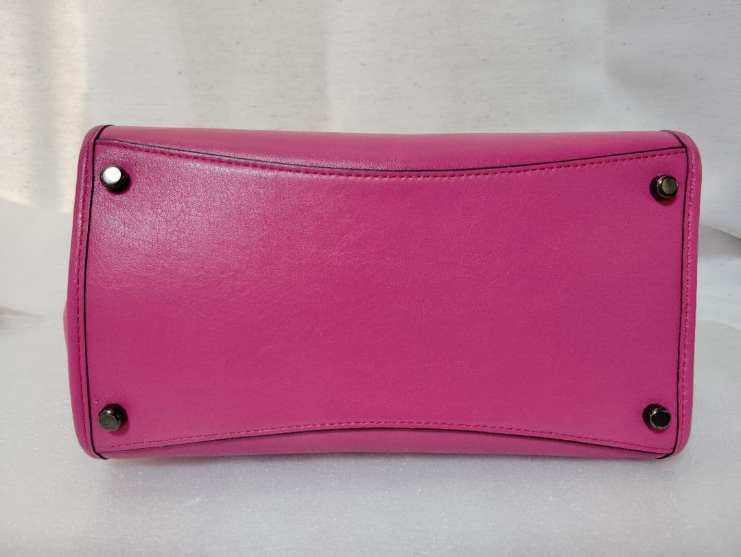 まゆちゃん　コーチ マゼンタ スタッズ フローラルレザー クロスビート